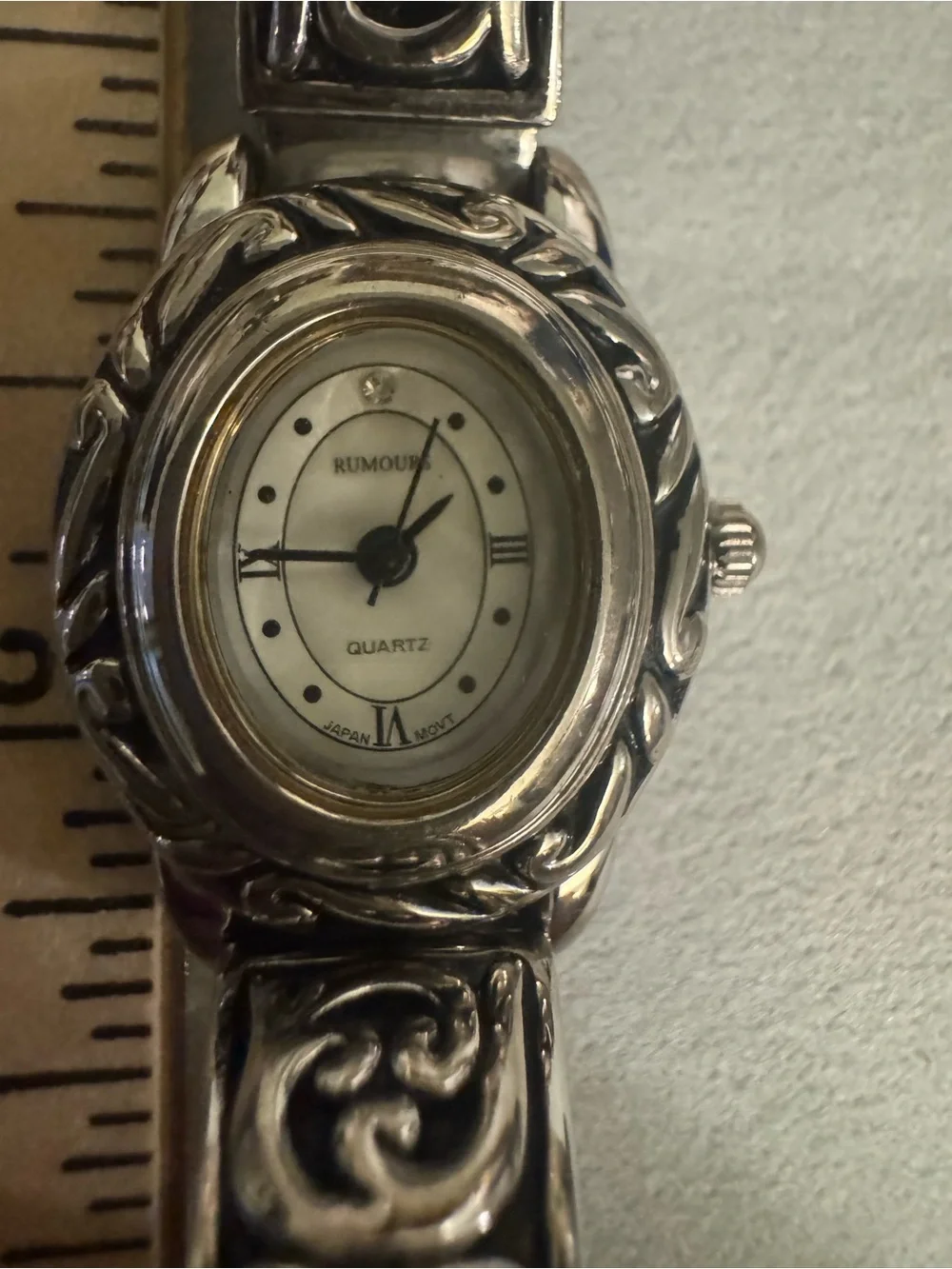 Rumors Women's Oval Bracelet Watch - Elegant Filigree
